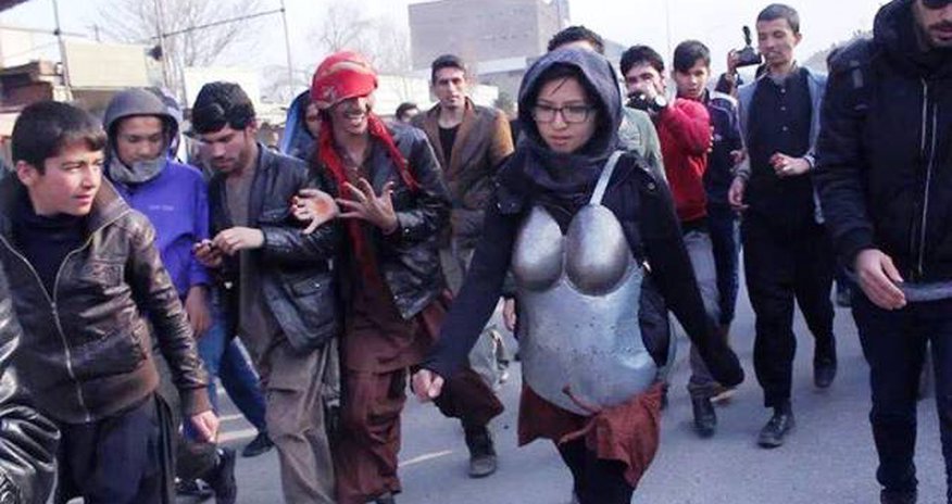 Woman in armour protesting against sexual harassment pelted with rocks Woman in armour protesting against sexual harassment pelted with rocks