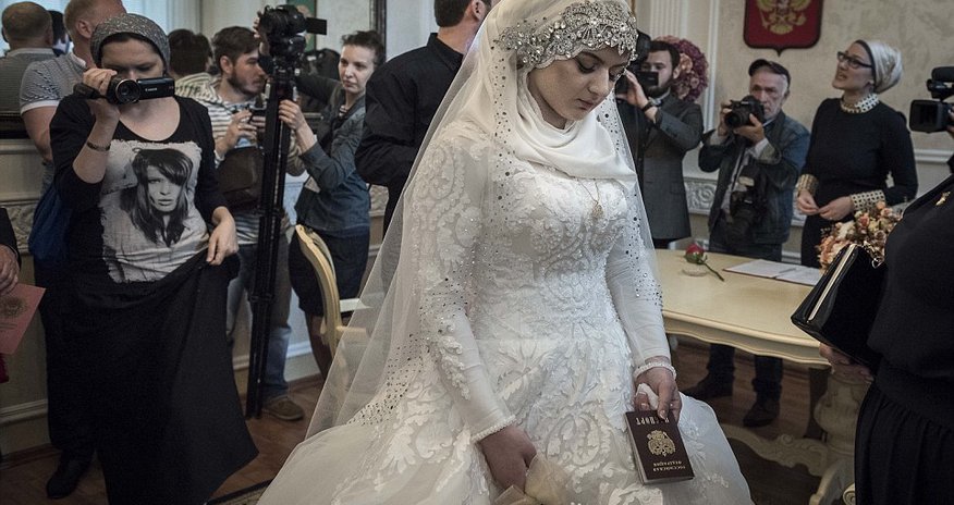 Bride was forced to marry Chechen police chief after 'he threatened her with kidnap' Bride was forced to marry Chechen police chief after 'he threatened her with kidnap'