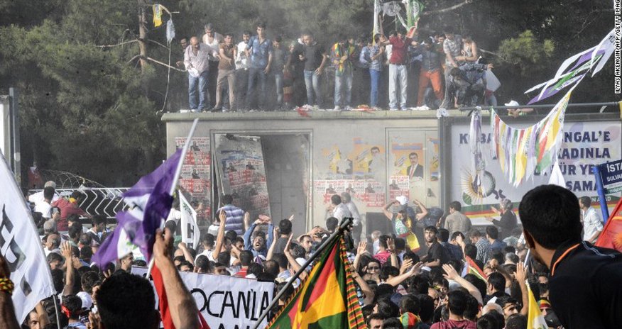 Explosions at Turkish political rally kill at least 2, injure 100 Explosions at Turkish political rally kill at least 2, injure 100