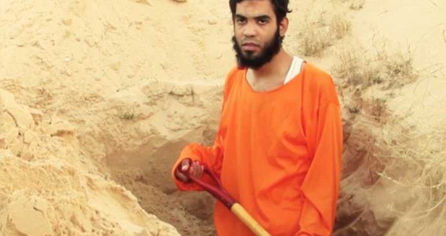Prisoner forced to dig his own grave in the desert Prisoner forced to dig his own grave in the desert