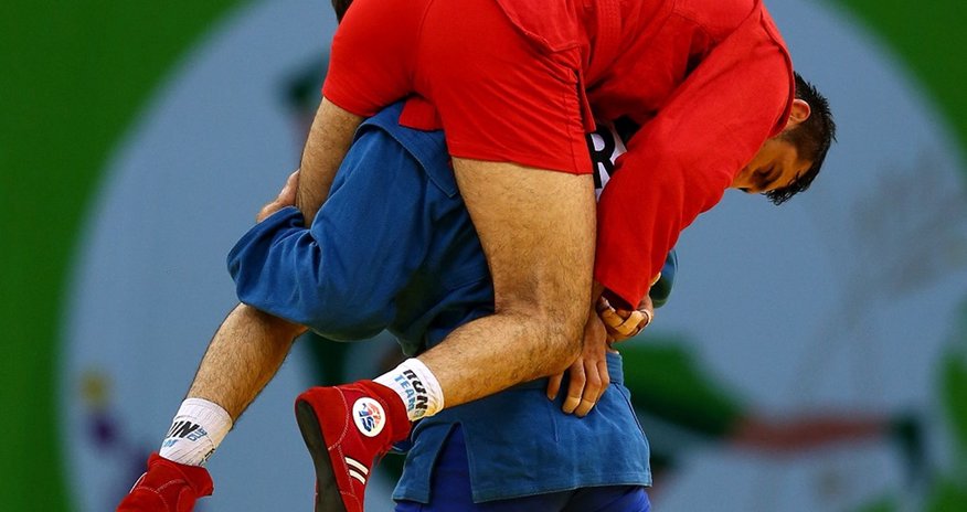 Victorious Sambo fighter carries injured Azeri opponent off Victorious Sambo fighter carries injured Azeri opponent off
