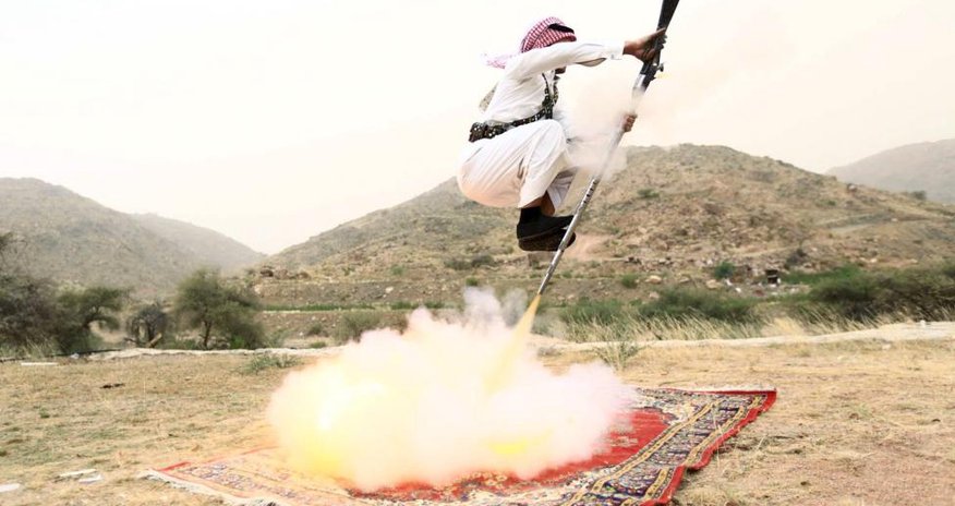The Saudi tradition of firing rifles at one's own feet in celebration The Saudi tradition of firing rifles at one's own feet in celebration