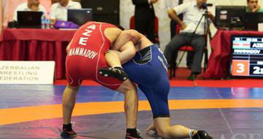Azerbaijani wrestlers beat Armenian rivals Azerbaijani wrestlers beat Armenian rivals