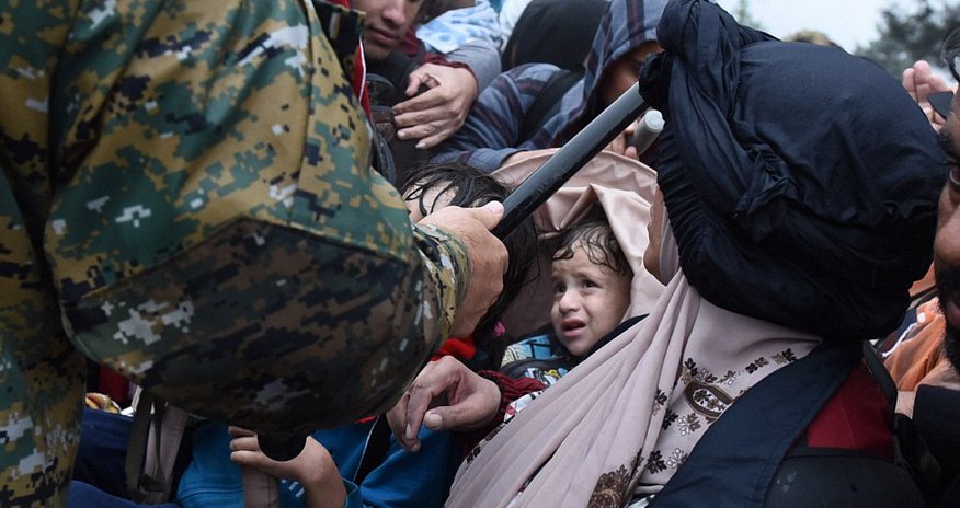 Thousands of migrants battle with riot police Thousands of migrants battle with riot police