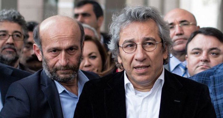 Turkish journalists charged with spying over weapons report Turkish journalists charged with spying over weapons report