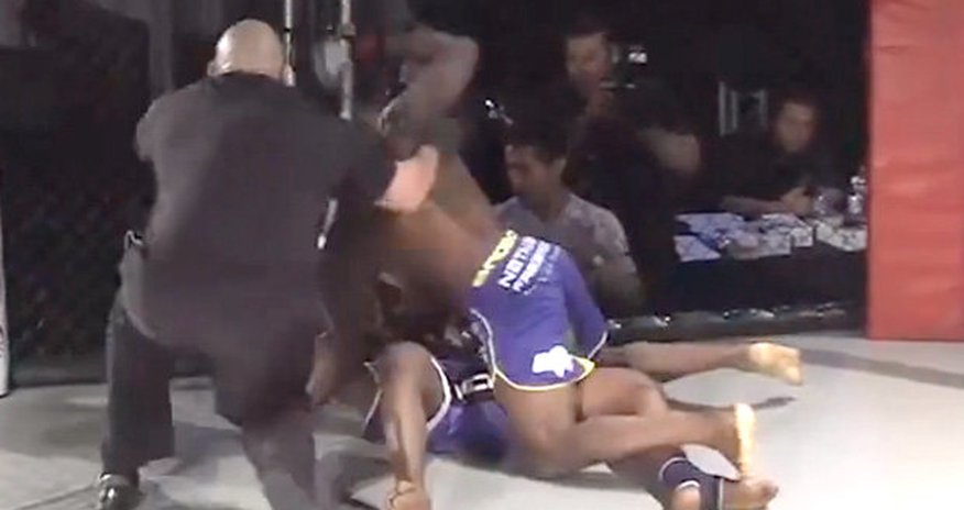 MMA fighter pummelling KOed opponent on floor gets shock of his life MMA fighter pummelling KOed opponent on floor gets shock of his life