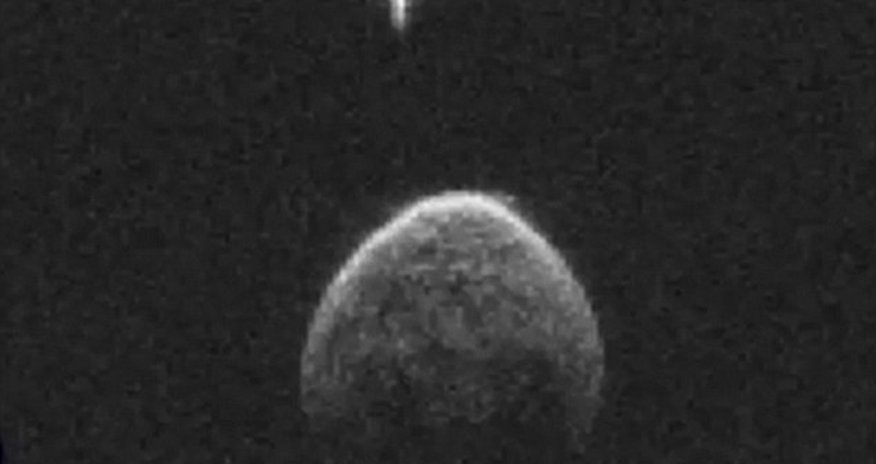 Is this a 230ft UFO orbiting an asteroid? Is this a 230ft UFO orbiting an asteroid?