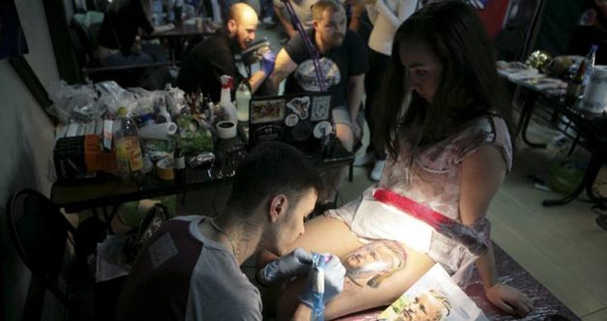 Tattoo artists compete for top awards at international festival Tattoo artists compete for top awards at international festival
