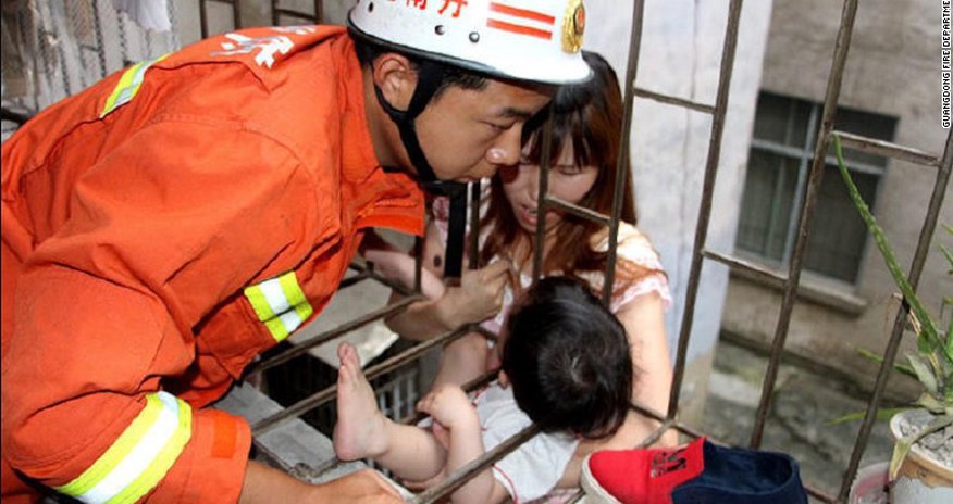 Toddler left home alone rescued after slipping through balcony bars Toddler left home alone rescued after slipping through balcony bars