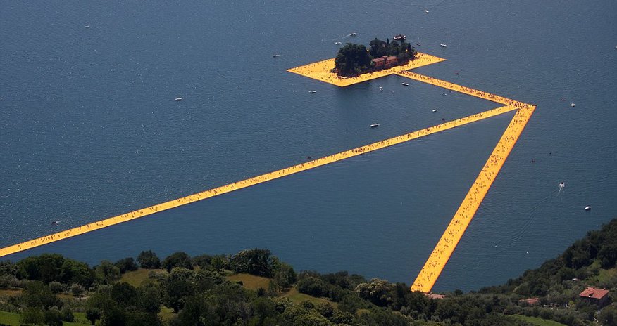 Thousands of tourists flock to Italian lake to stroll on a 1.9-mile floating art installation Thousands of tourists flock to Italian lake to stroll on a 1.9-mile floating art installation