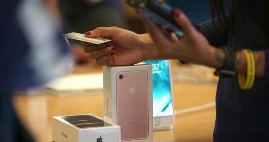 Apple's holiday surprise: big sales, not so big profits Apple's holiday surprise: big sales, not so big profits
