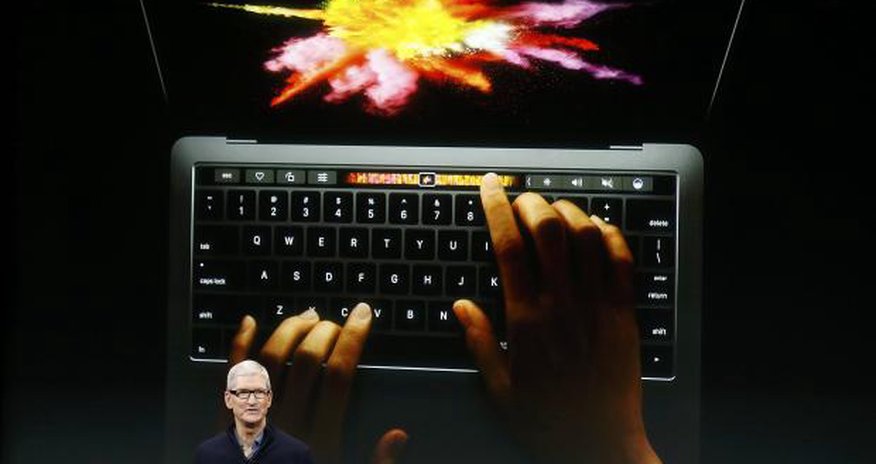 Apple adds touch screen keys to MacBook Pro Apple adds touch screen keys to MacBook Pro