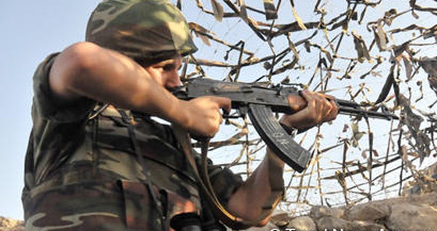 Armenian armed forces fire at Azerbaijani positions with large-caliber machine guns and sniper rifles Armenian armed forces fire at Azerbaijani positions with large-caliber machine guns and sniper rifles
