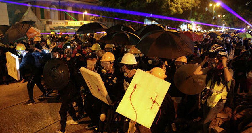 Hong Kong police arrest 36 people after running battles with protesters Hong Kong police arrest 36 people after running battles with protesters