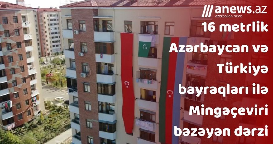 16 metrlik Azərbaycan və Türkiyə bayraqları ilə Mingəçeviri bəzəyən dərzi-VİDEO 16 metrlik Azərbaycan və Türkiyə bayraqları ilə Mingəçeviri bəzəyən dərzi-VİDEO