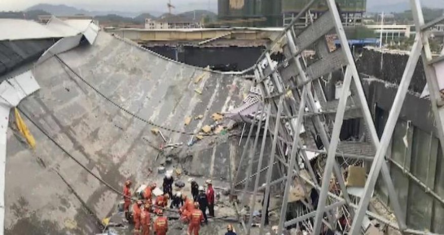 Çində çökən binanın altından 53 cəsəd çıxarılıb Çində çökən binanın altından 53 cəsəd çıxarılıb